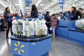 Customers complete their purchases ahead of Black Friday at a Walmart store in Chicago